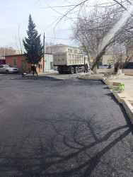 Qaradağ rayonu Sahil qəsəbəsində asflat örtüyü salınır