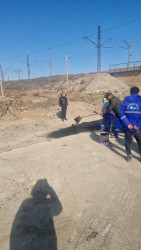 Qaradağ rayonu Qobustan qəsəbəsində asfalt örtüyü salınır