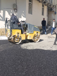 Qaradağ rayonu Sahil qəsəbəsində asflat örtüyü salınır